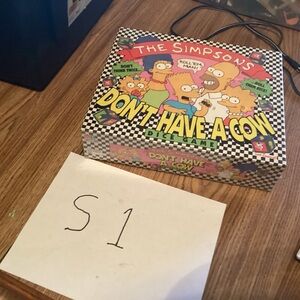 Simpsons don’t have a cow board game new still in shrink wrap.
